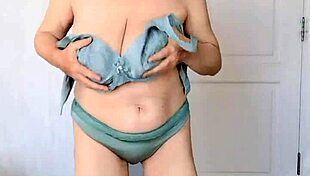 Look At This Busty Granny Masturbating!