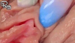 Close-up view of a beautiful creamy pussy during intense masturbation with a vibrator