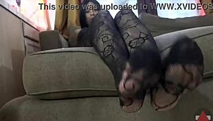 Ebony babe in body suit nylons gets her feet worshipped by amateur fetish lover.