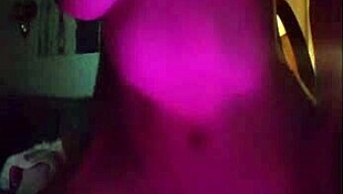 Latina Woman Teases with Striptease