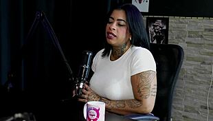 Marcelly Mello explains differences while exposing in sheer red lingerie for fetish compilation.