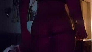 Latina Woman Teases with Striptease