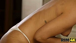 Beautiful Brunette Does Rimjob on Black