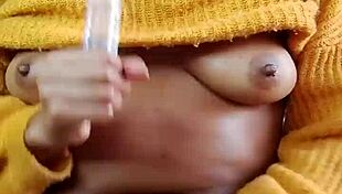 this hairy slut bounces on a dildo, squirting hard from her wet pussy while losing control.