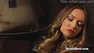 Naughty lesbian slave on her knees licking madame's pussy