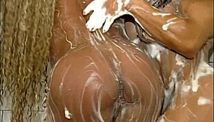 Denise Masino and Lynn McCrossin show off their muscular bodies in the gym