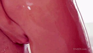 these hot lesbian lovers shower together sensually, teasing each other