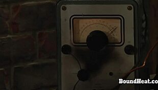 Two tied slaves whipped in garage