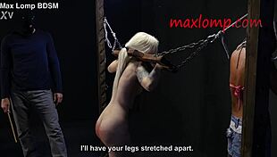 Sadistic guy canes petite blonde babe's narrow ass in BDSM
