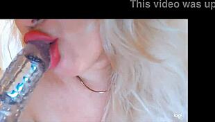 Blonde Babe Sucks Her Big Dildo in Close-Up View