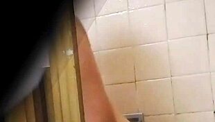 Spying on the beautiful Colombian teacher in the bathroom during her promotion trip.