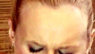 She does a striptease while her husband takes a bath.