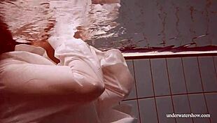intriguing babe lola's big natural tits underwater