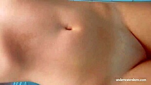 intriguing babe lola's big natural tits underwater