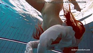 intriguing babe lola's big natural tits underwater