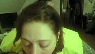 This redhead slut lays on her belly, deepthroating like a submissive slave