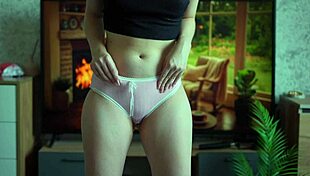 Sexy Brunette Tries on Panties and Pees Standing