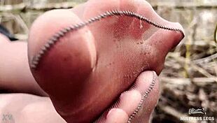 Goddess Teases Feet In Pantyhose Forest!