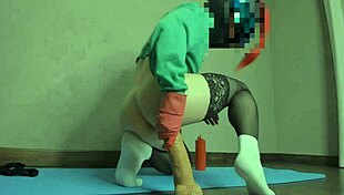 Watch that transsexual's ass open wide with a huge dildo!