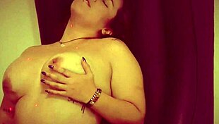 Latina In Red Lingerie Masturbates Her Huge Tits! She Unleashes Sensual Pleasure.