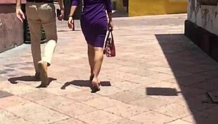 this rich cougar's ass is getting spied on in a voyeur scene