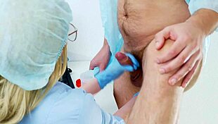 Female doctor gives intense prostate massage to patient in hospital setting.