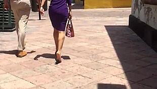 this rich cougar's ass is getting spied on in a voyeur scene