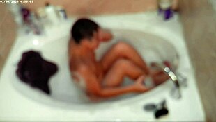 asian boy enjoys solo bubble bath in homemade bathroom setting