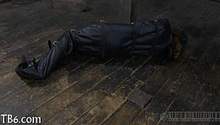 hey, this restrained girl is getting punished hard in the garage