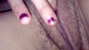 Katrina fingers her small tits!