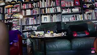 a busty girl with massive tits dominates ebony babe in bondage