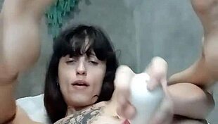 Young Amateur Uses Dildo On Her Natural Tits And Pussy.