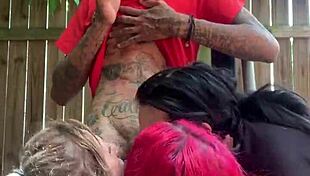 Redhead participates in rough interracial group orgy foursome action