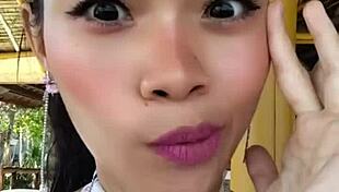 Beauty asian girl shows off huge dildo in homemade video