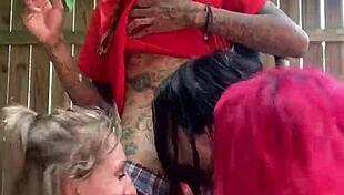 Redhead participates in rough interracial group orgy foursome action