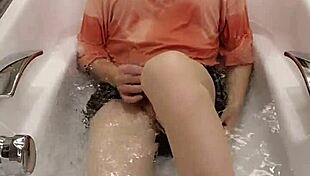 shemale ting xuan relaxes in the bathtub with her skirt on, masturbating barefoot while showing off her feet
