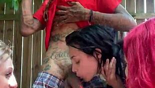 Redhead participates in rough interracial group orgy foursome action