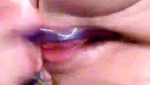 Slow motion close-up of wife plunging toy into dripping squirting pussy