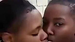 Two Liberian Lesbos Making Out Outdoors