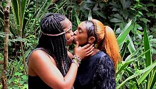 African milfs sneak kisses at wild party