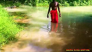 Fucking that african whore in the stream with big dick!