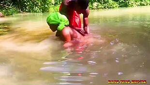 Fucking that african whore in the stream with big dick!