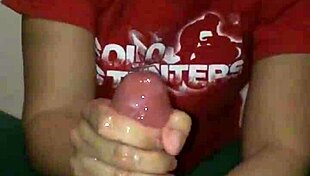 big cock intensely strokes out a huge load of cum in handjob