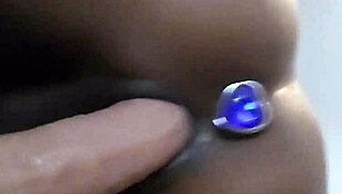 i play with my black dildo on bed