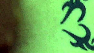 colombian crossdresser in doggystyle pose on sofa