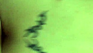 colombian crossdresser in doggystyle pose on sofa