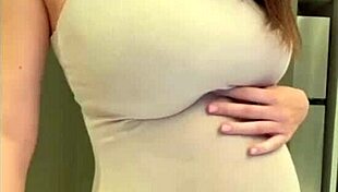 My stepmom flaunts her elastic ass and huge milky tits while I watch in awe. She teases with every move.