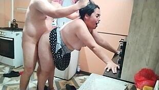 Stepmothers spoiled stepson fucks her wet pussy in the kitchen