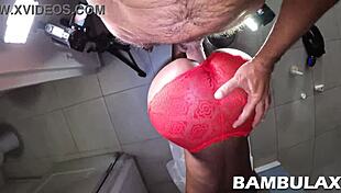 Lingerie-clad couple in doggystyle, bent over for huge cock fucking.