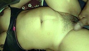 desi village bhabhi enjoys time with her husband in the dorm, shaking ass and eating food.